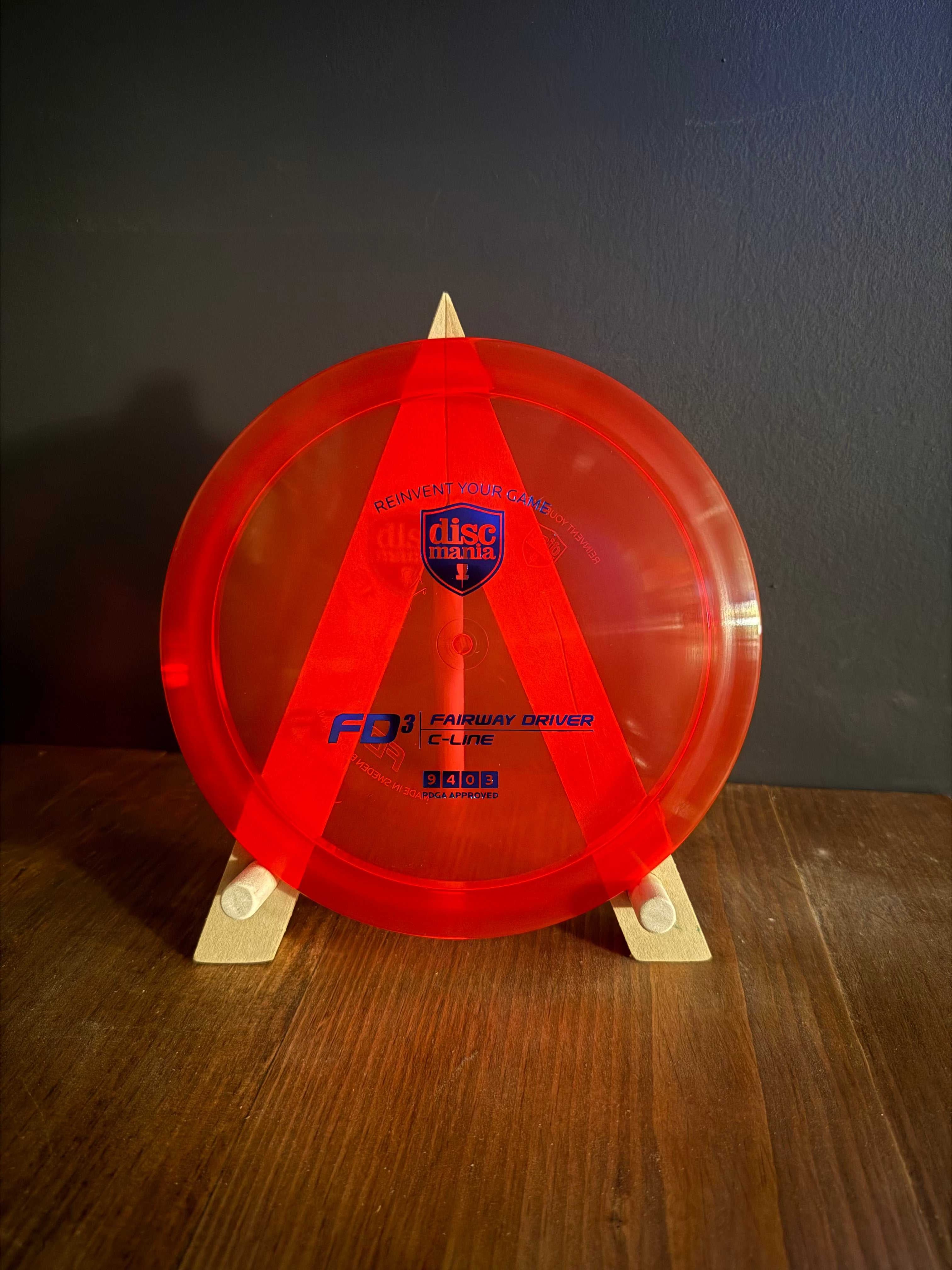 C-Line FD3 fairway driver in translucent red plastic with bold red stamp and clear embossed detailing