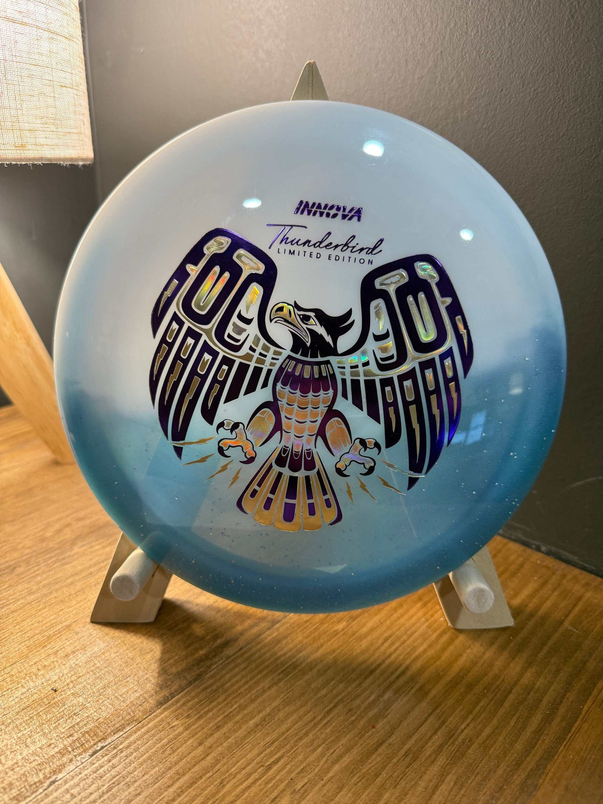 Duo Thunderbird fairway driver in translucent blue plastic, featuring a detailed purple, gold and black thunderbird graphic
