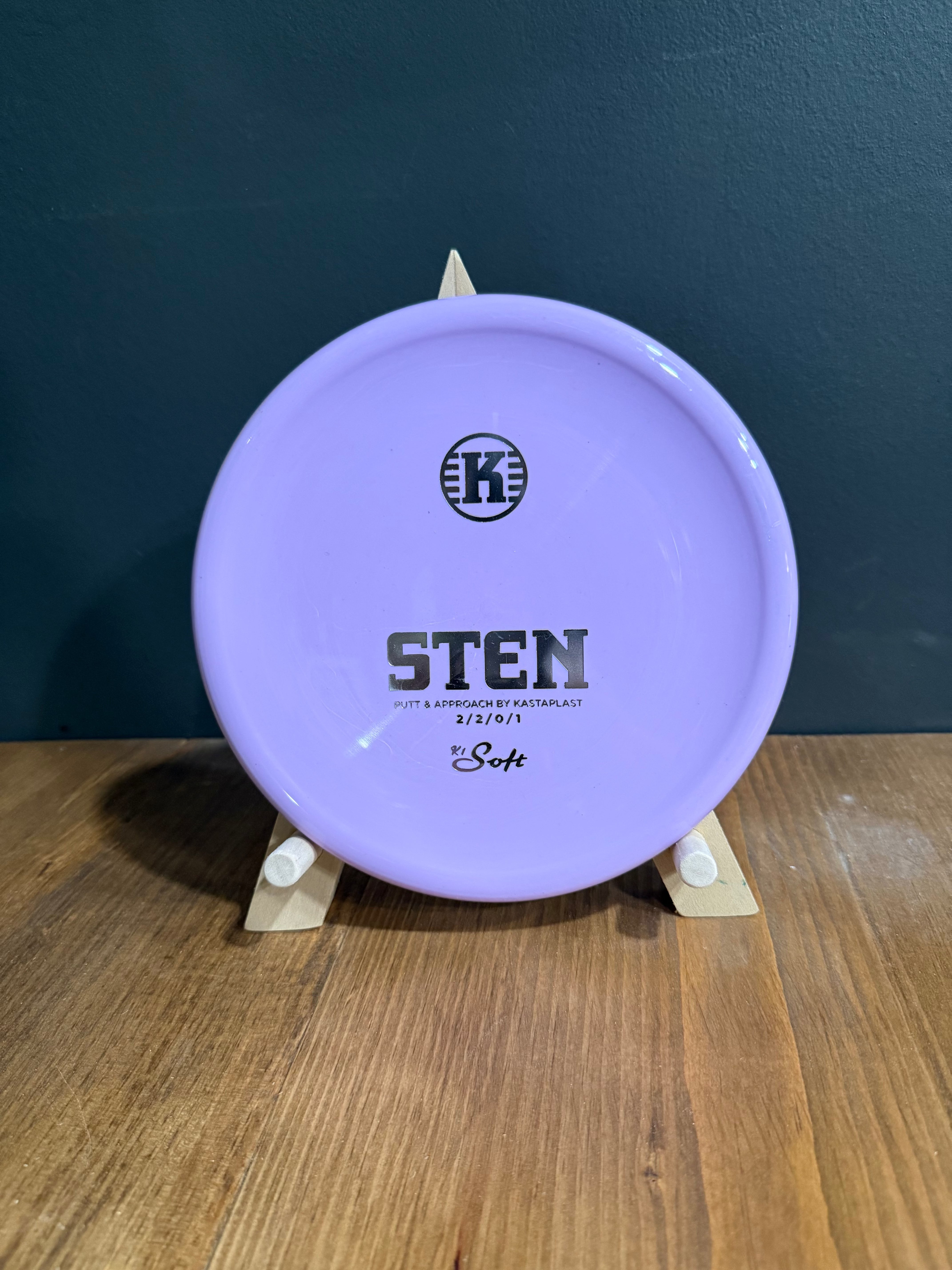 Kastaplast K1 Soft Sten disc golf approach disc in lavender purple with a smooth, shallow profile and printed stamp